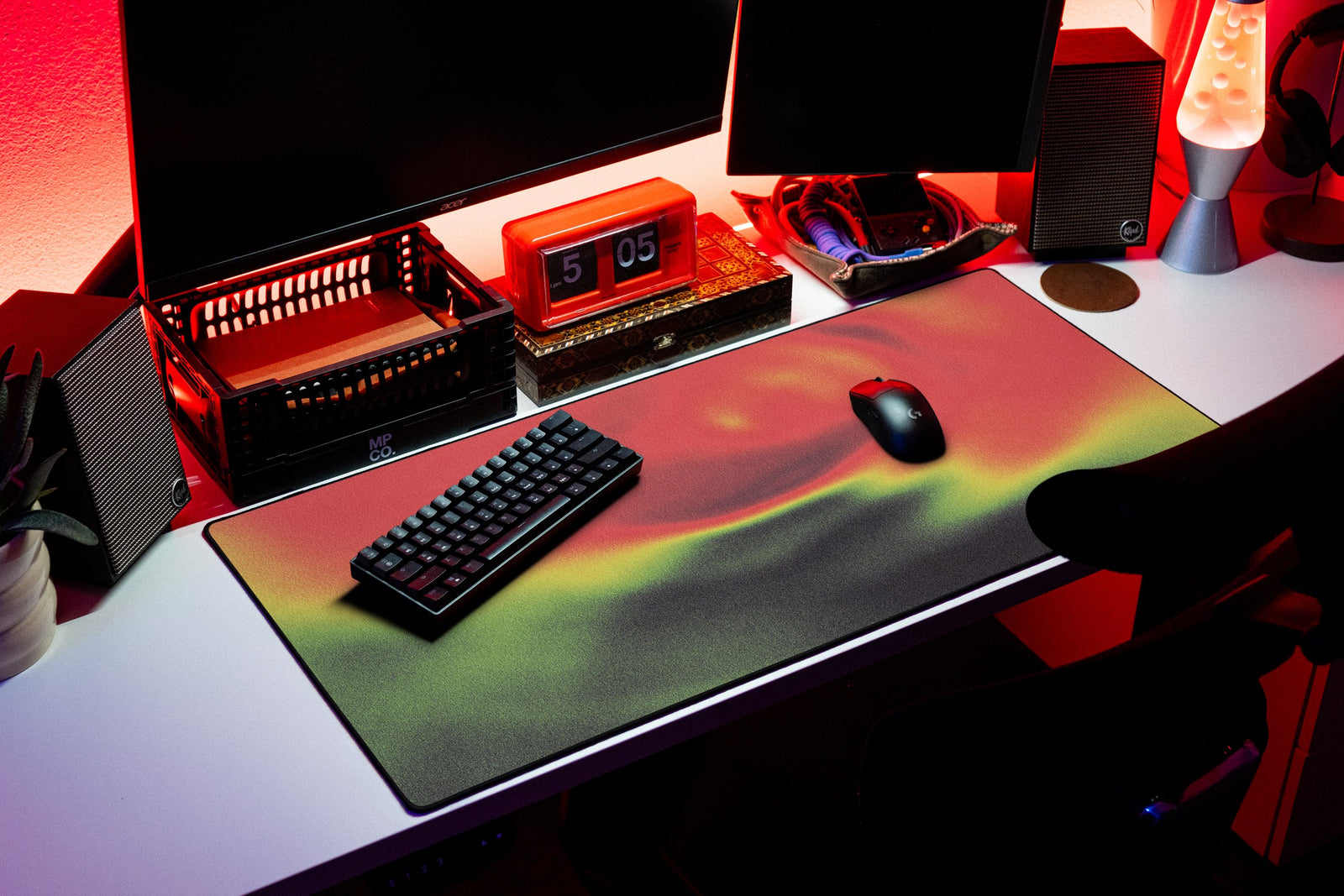 Aura desk mat in Ember Haze, shown on a styled desk setup