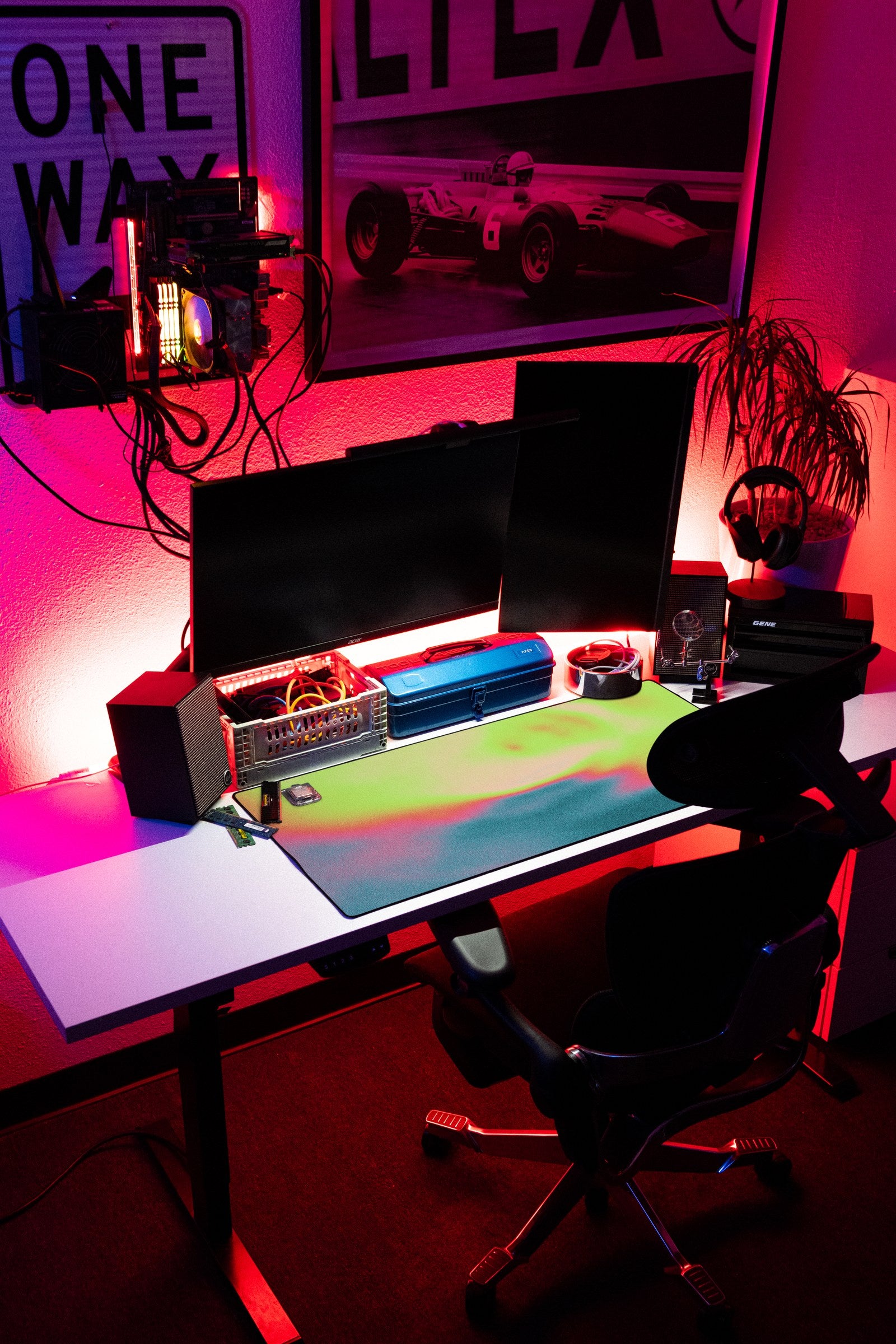 Aura desk mat in Neon Meadow, shown on a styled desk setup