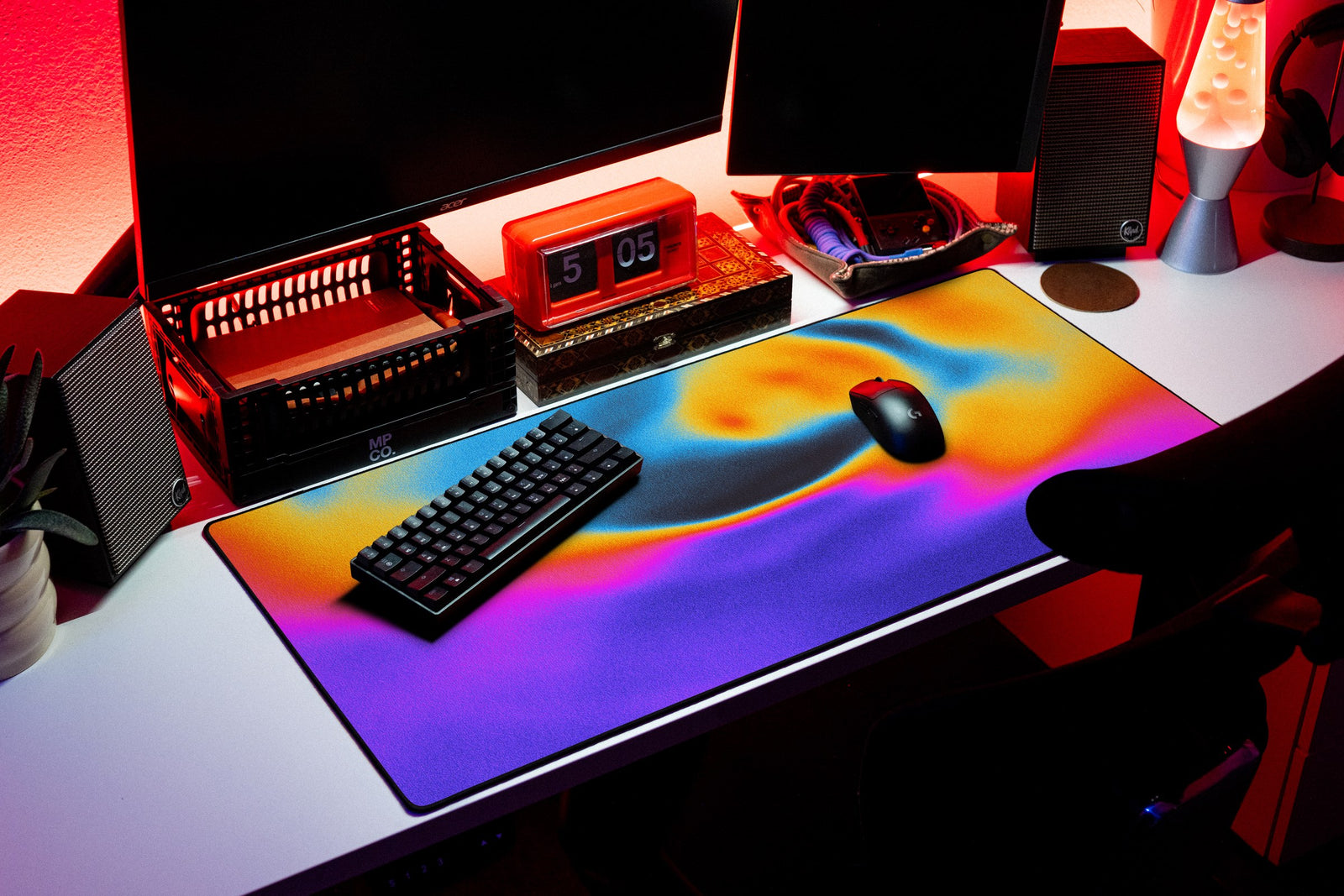 Aura desk mat in Prism Dusk, shown on a styled desk setup