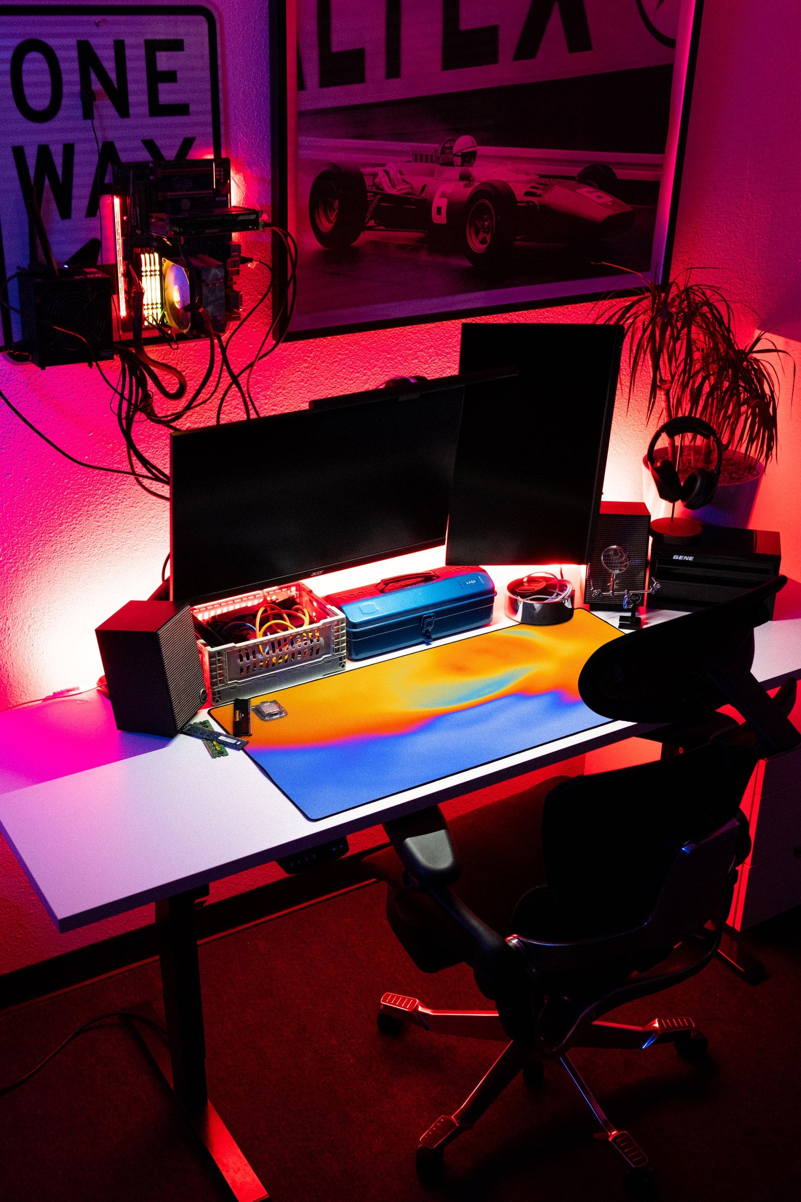 Aura desk mat in Tangerine Sky, shown on a styled desk setup