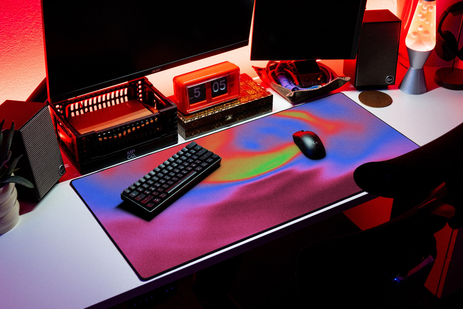 Aura desk mat in Violet Mist, shown on a styled desk setup
