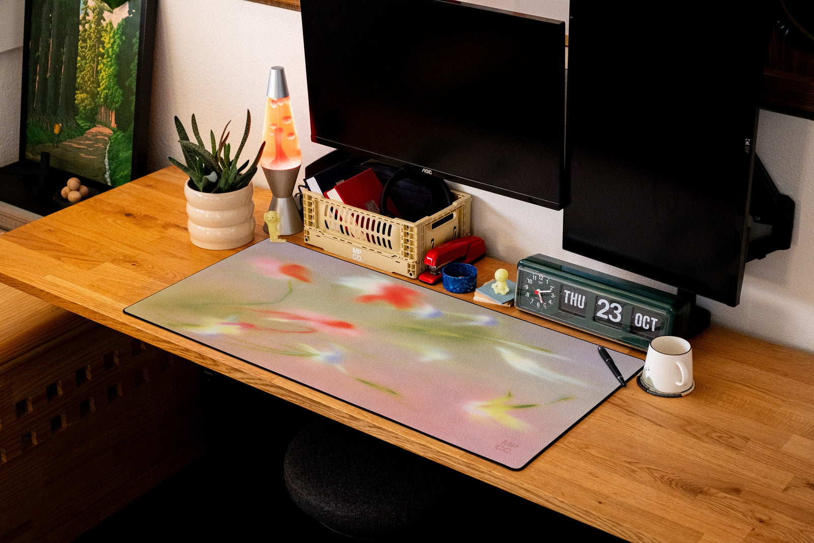 Bloom desk mat in Original, shown on a styled desk setup