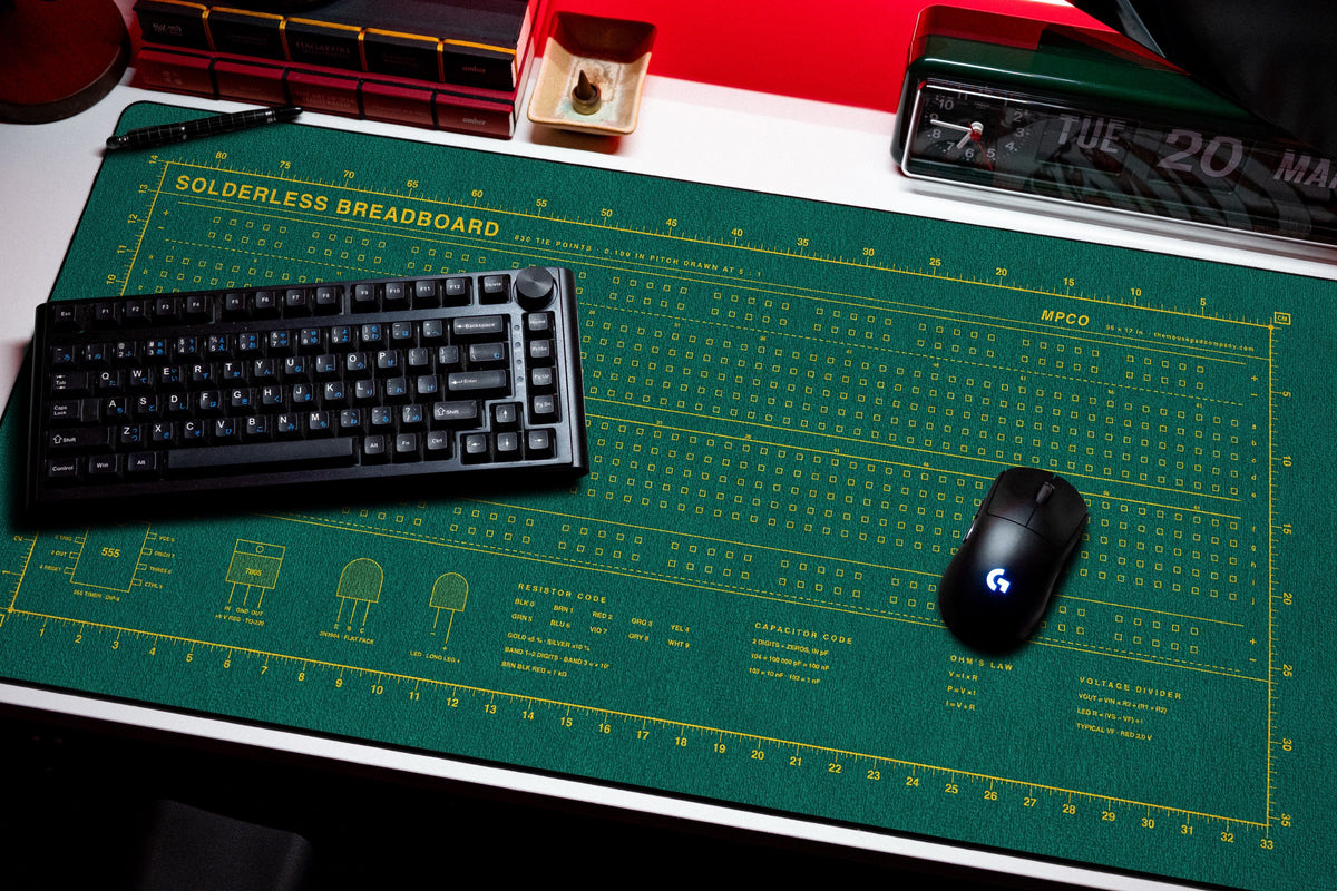 Breadboard Pad desk mat in Green / Yellow, shown on a styled desk setup