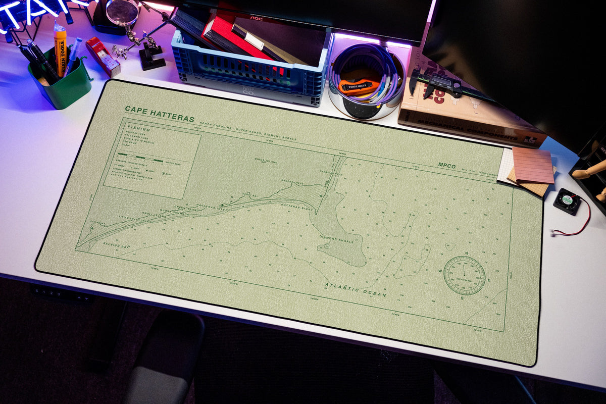 Cape Hatteras Nautical Chart Pad desk mat in Buff / Green, shown on a styled desk setup