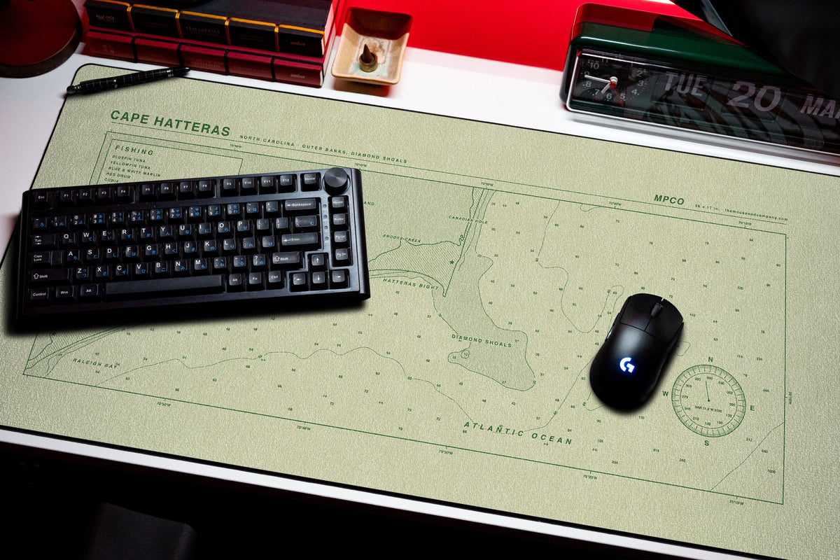 Cape Hatteras Nautical Chart Pad desk mat in Buff / Green, shown on a styled desk setup
