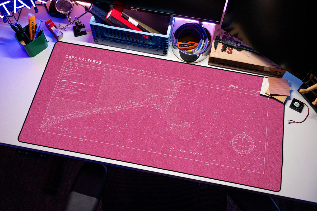 Cape Hatteras Nautical Chart Pad desk mat in Pink / White, shown on a styled desk setup