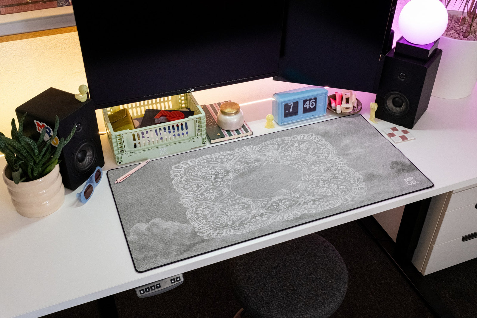 Celeste desk mat in Gray Sky, shown on a styled desk setup