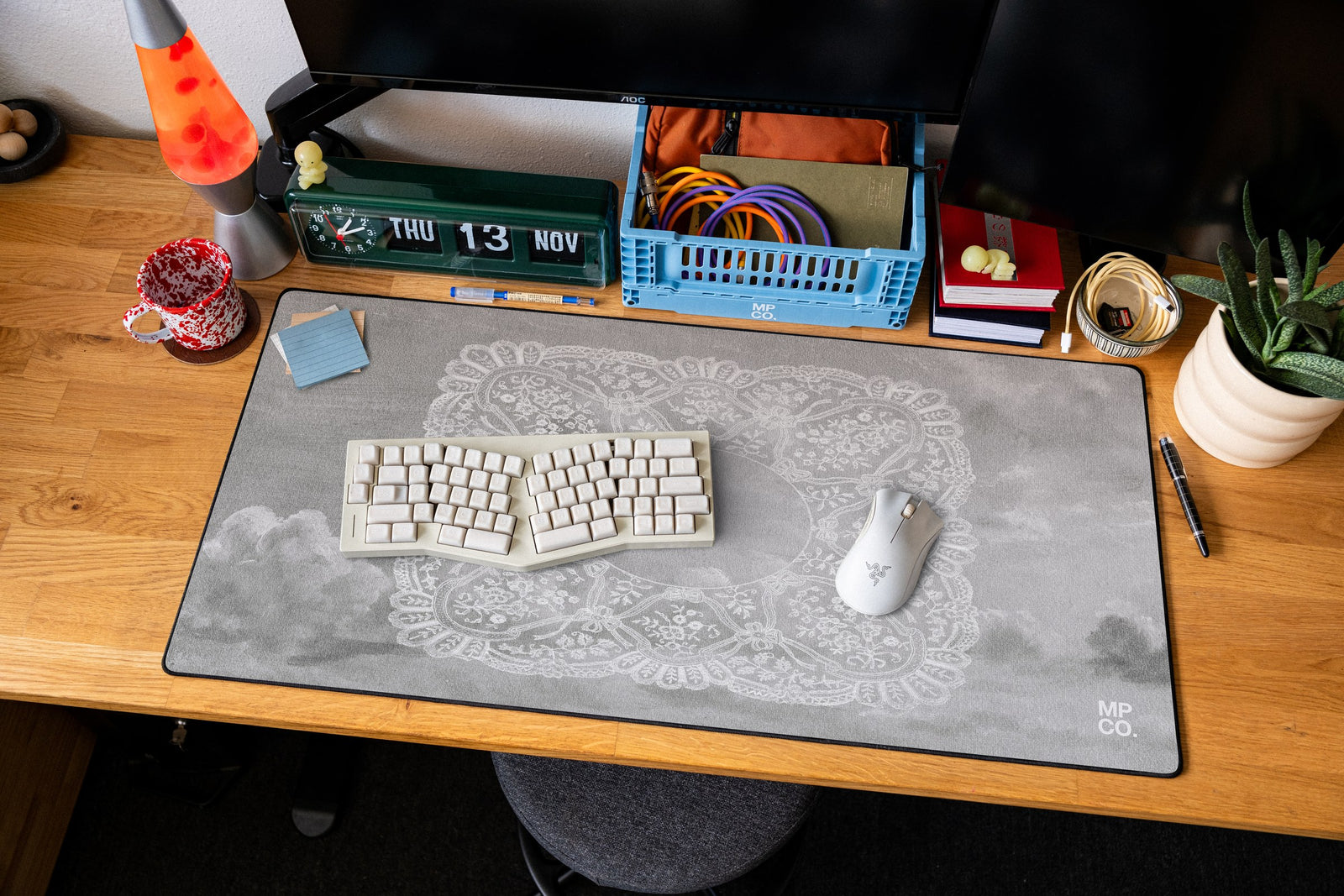 Celeste desk mat in Gray Sky, shown on a styled desk setup