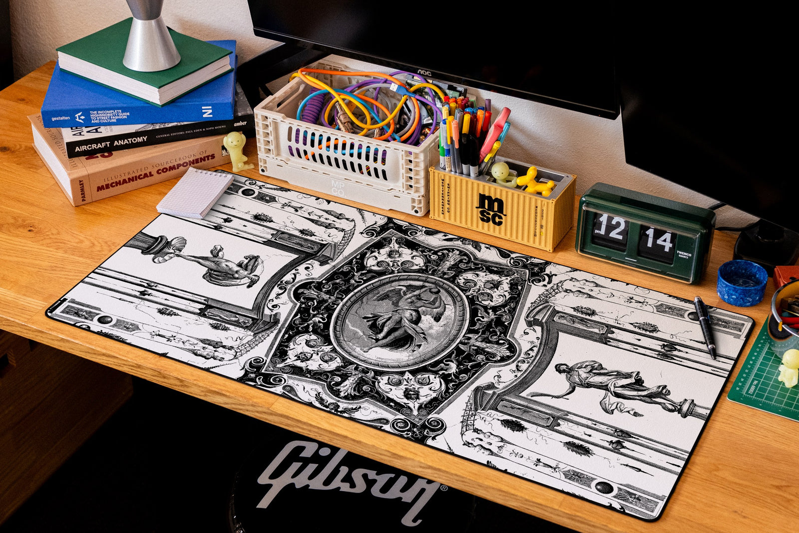 Celestial Messenger desk mat in Dither, shown on a styled desk setup