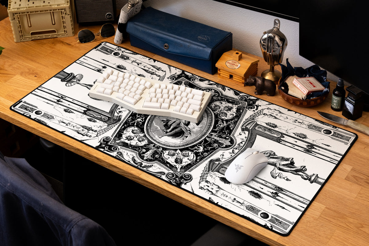 Celestial Messenger desk mat in Dither, shown on a styled desk setup