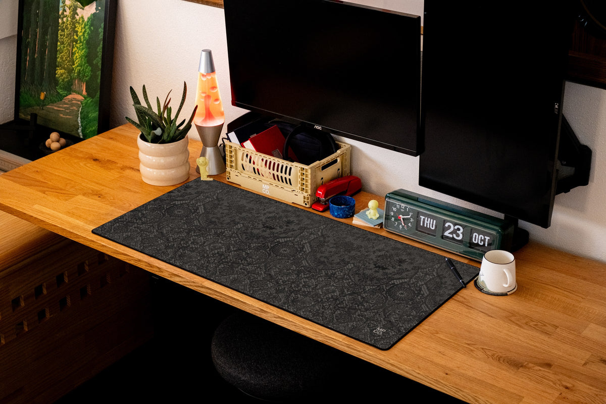 Chantilly desk mat in Black, shown on a styled desk setup
