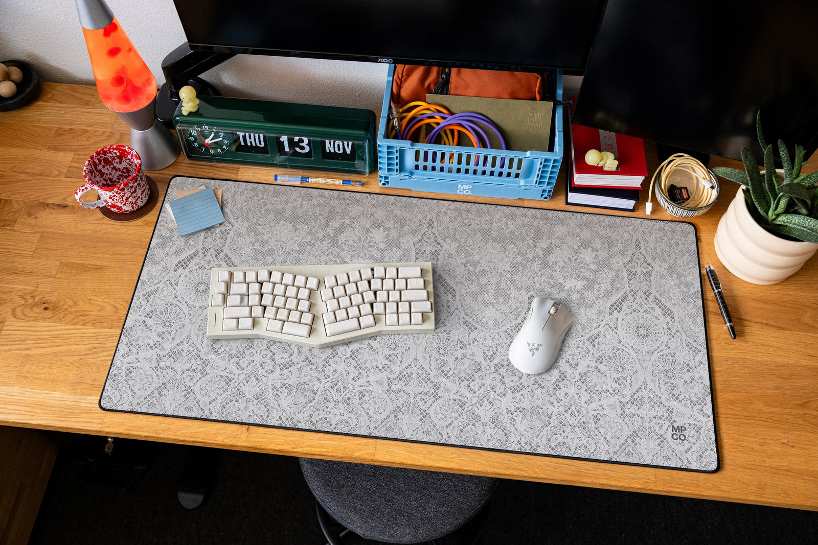 Chantilly desk mat in Ivory, shown on a styled desk setup