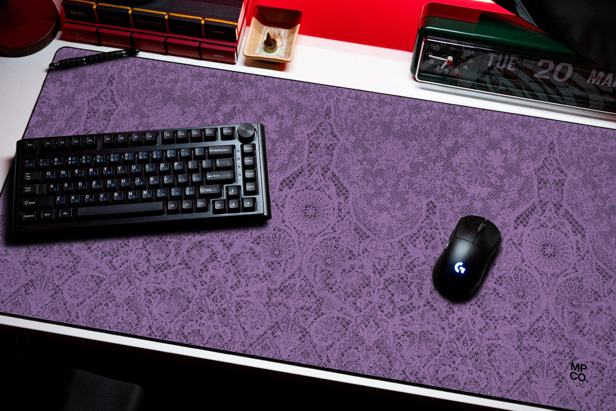 Chantilly desk mat in Purple, shown on a styled desk setup
