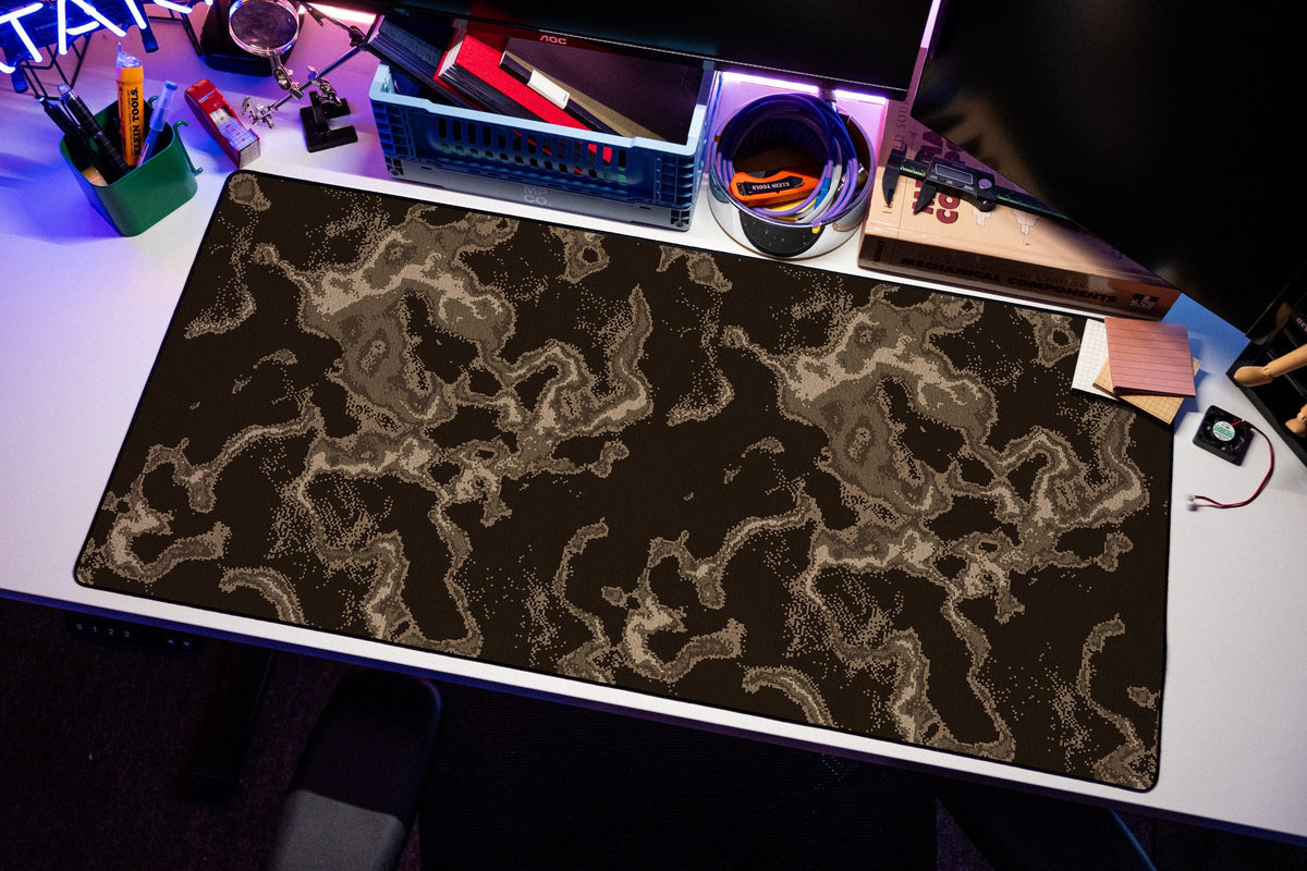 Ember desk mat in Brown, shown on a styled desk setup