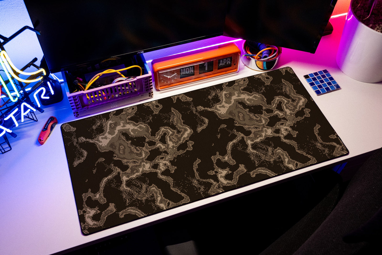Ember desk mat in Brown, shown on a styled desk setup