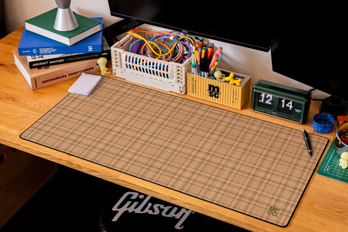 Flannel Plaids 2026 Fall desk mat in Apricot, shown on a styled desk setup