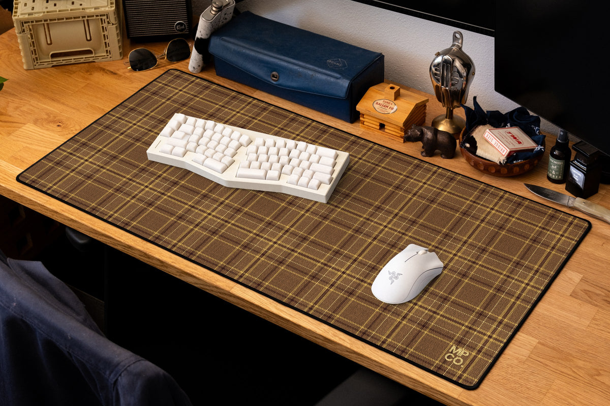 Flannel Plaids 2026 Fall desk mat in Caramel, shown on a styled desk setup