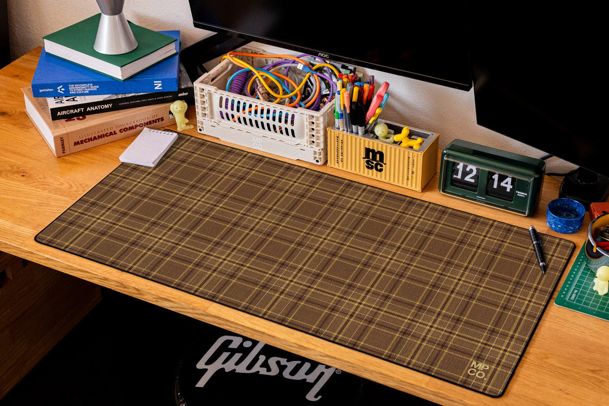 Flannel Plaids 2026 Fall desk mat in Caramel, shown on a styled desk setup
