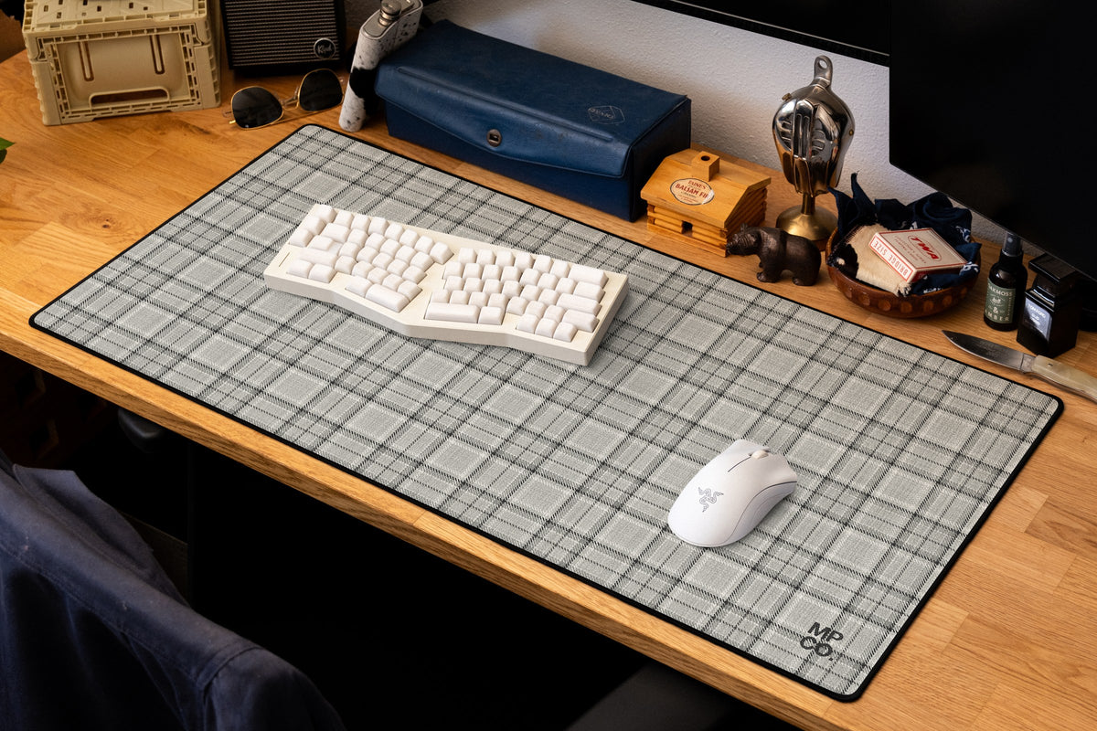 Flannel Plaids 2026 Fall desk mat in Dove, shown on a styled desk setup
