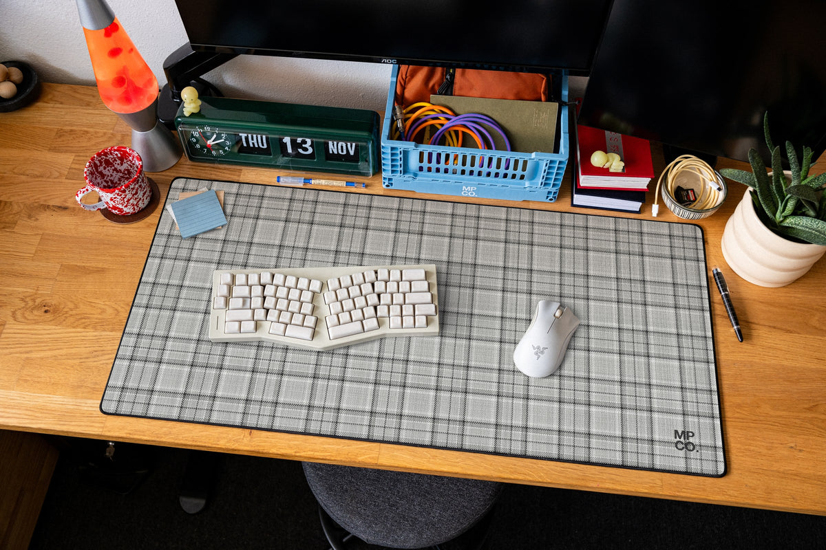 Flannel Plaids 2026 Fall desk mat in Dove, shown on a styled desk setup
