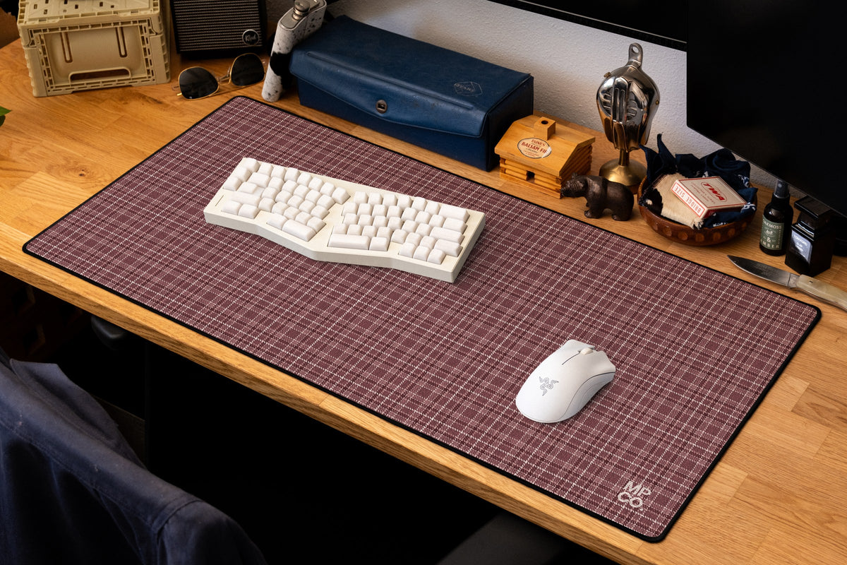 Flannel Plaids 2026 Fall desk mat in Mauve, shown on a styled desk setup