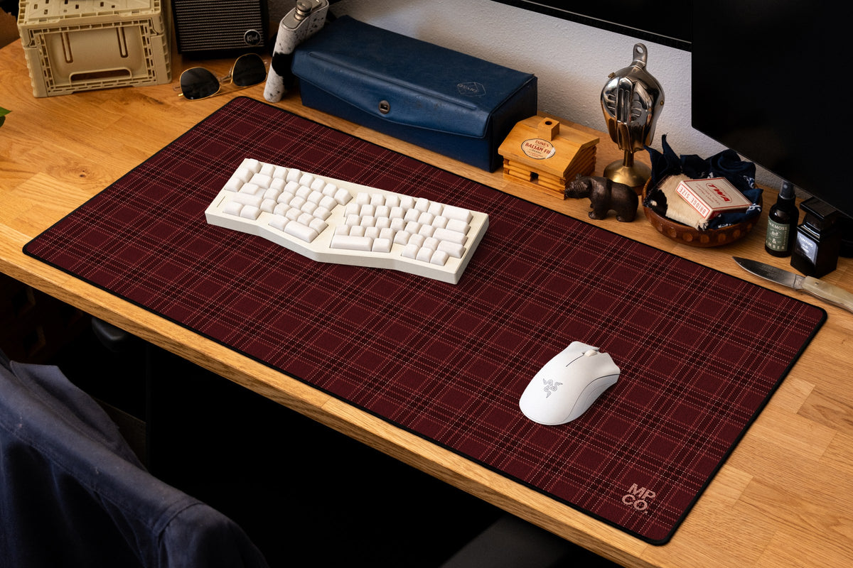Flannel Plaids 2026 Fall desk mat in Merlot, shown on a styled desk setup