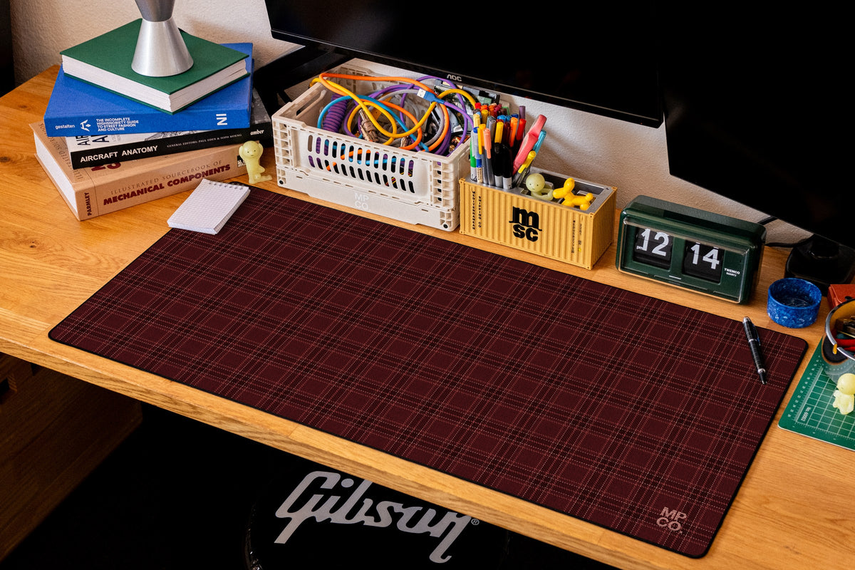 Flannel Plaids 2026 Fall desk mat in Merlot, shown on a styled desk setup