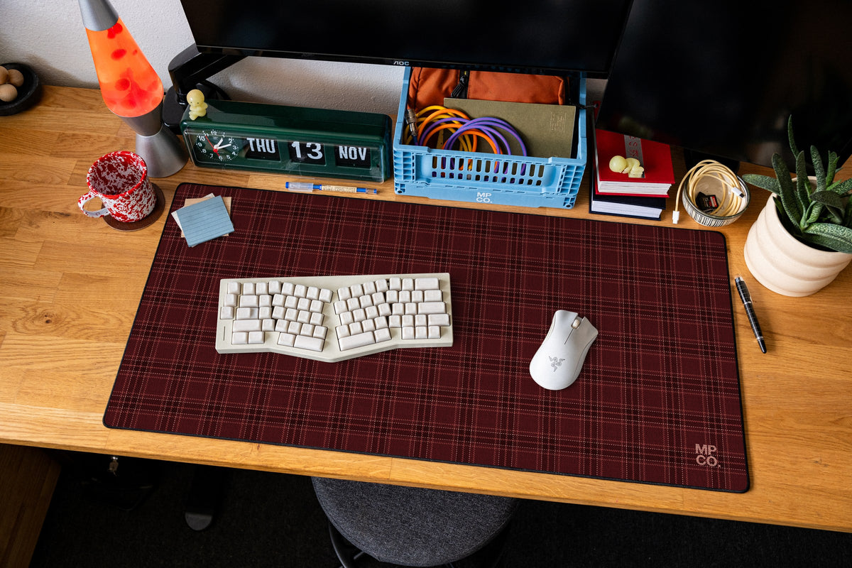 Flannel Plaids 2026 Fall desk mat in Merlot, shown on a styled desk setup