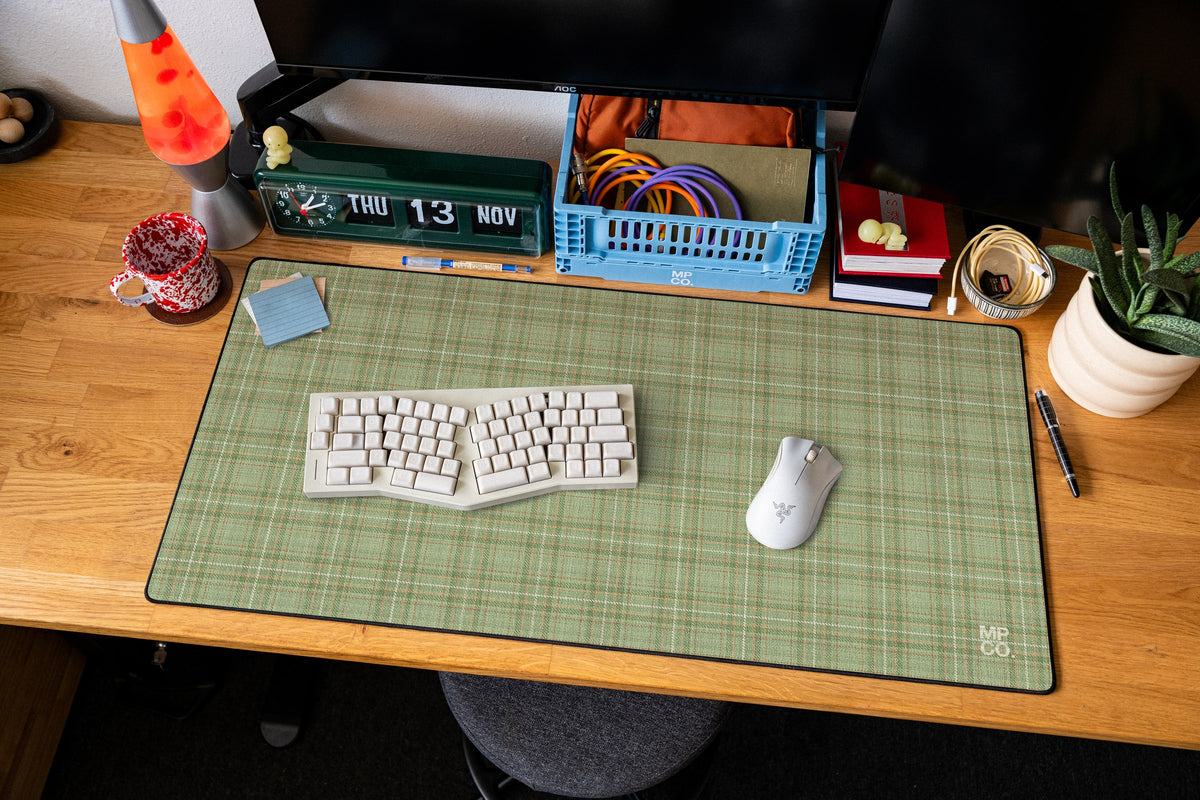 Flannel Plaids 2026 Fall desk mat in Sage, shown on a styled desk setup