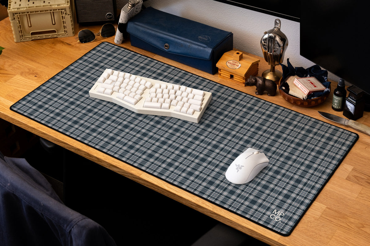 Flannel Plaids 2026 Fall desk mat in Slate, shown on a styled desk setup