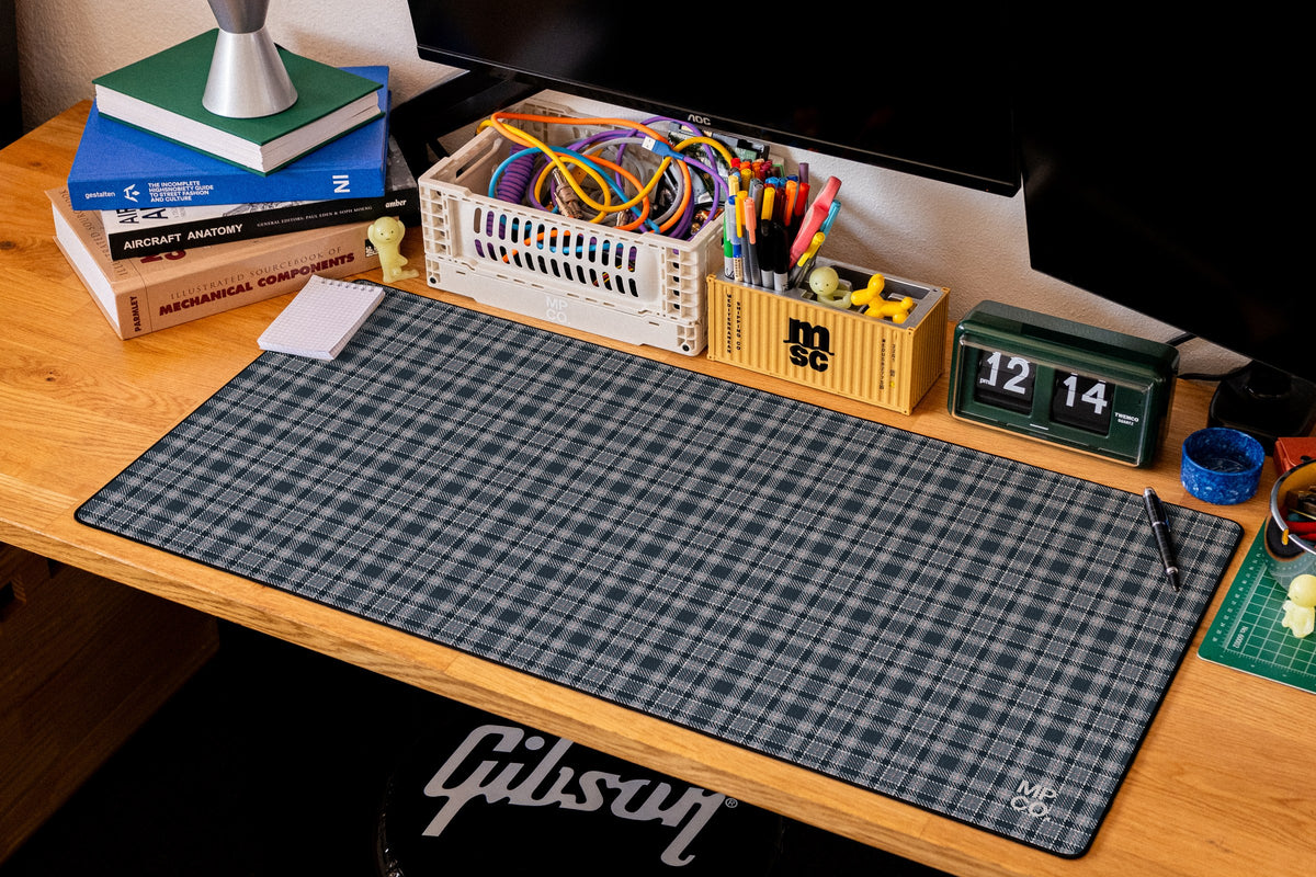 Flannel Plaids 2026 Fall desk mat in Slate, shown on a styled desk setup