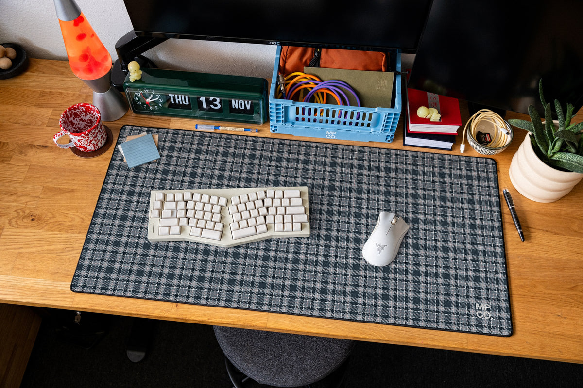Flannel Plaids 2026 Fall desk mat in Slate, shown on a styled desk setup