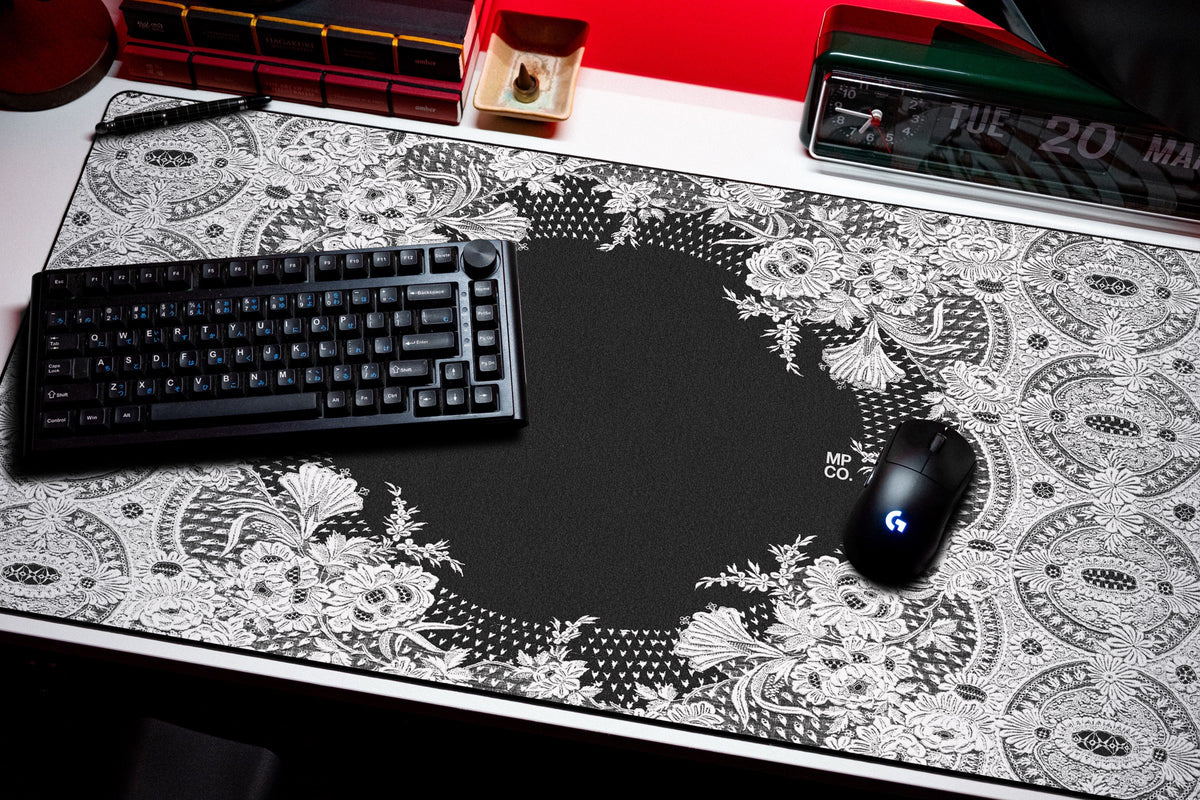 Floral Lace desk mat in White, shown on a styled desk setup