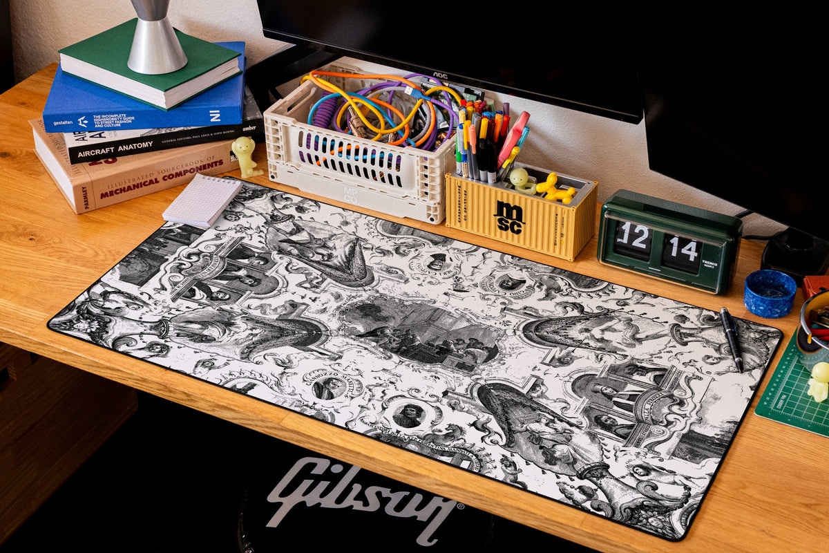 Florentine Ambassadors desk mat in Dither, shown on a styled desk setup