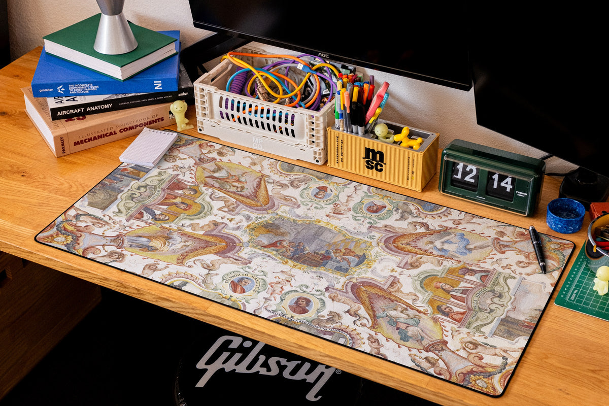 Florentine Ambassadors desk mat in Original, shown on a styled desk setup