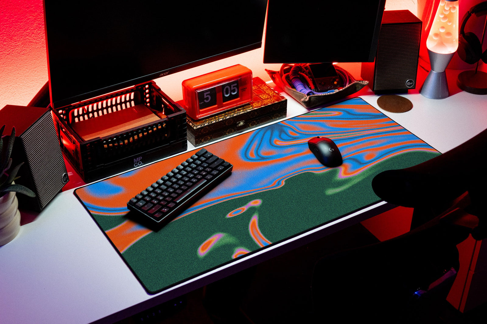Flux desk mat in Ember Oil, shown on a styled desk setup