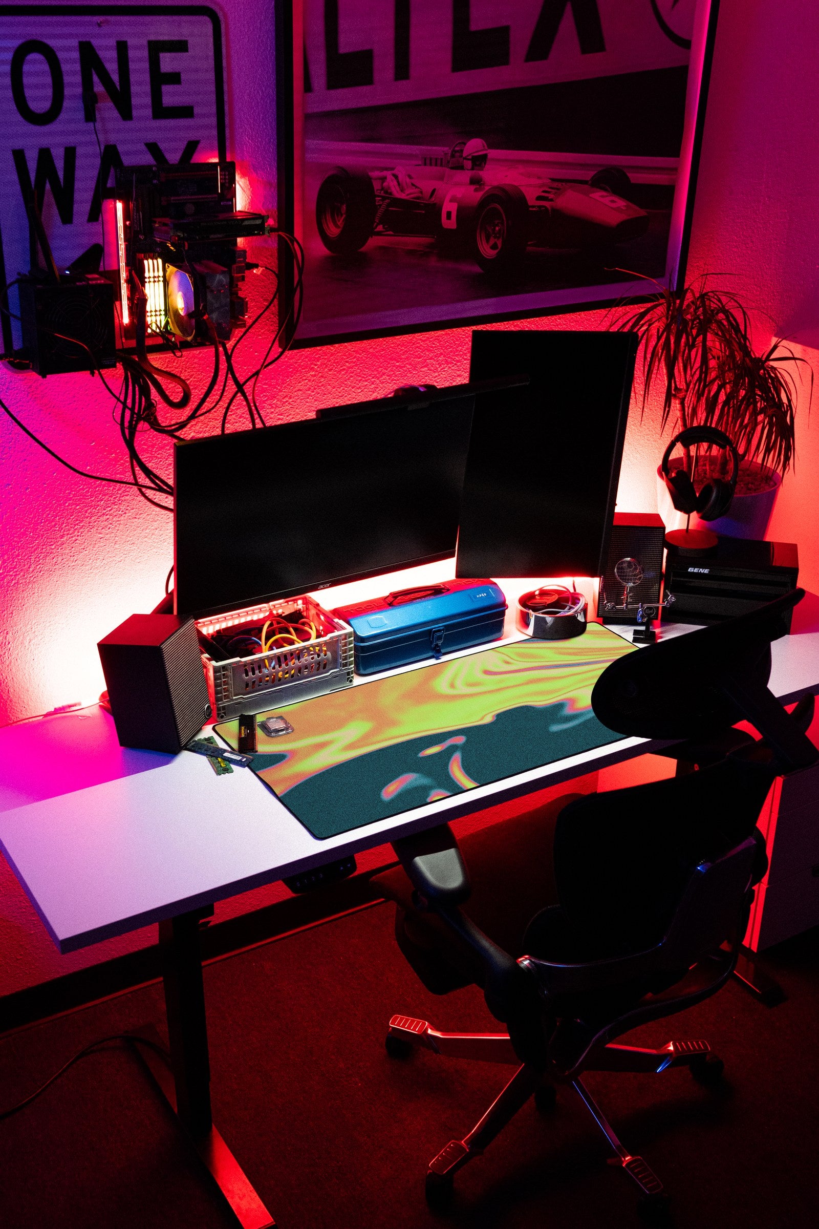 Flux desk mat in Toxic Bloom, shown on a styled desk setup