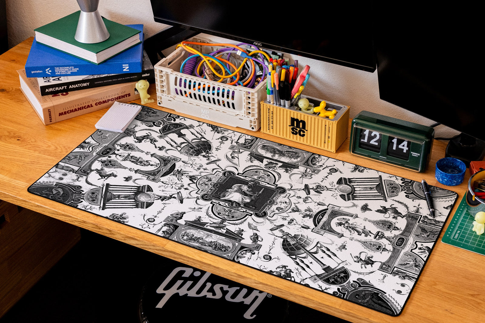 Fortitude desk mat in Dither, shown on a styled desk setup