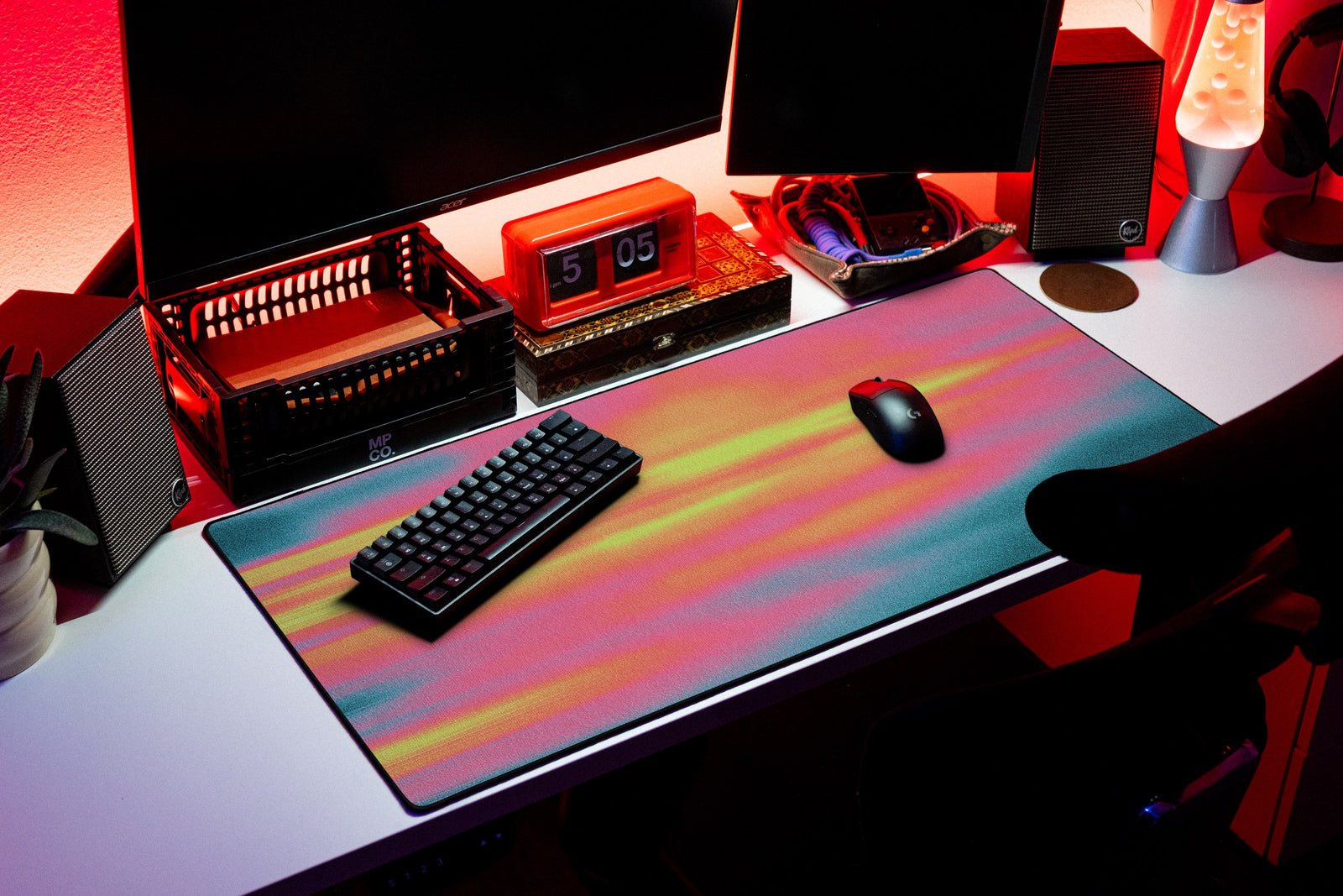Glare desk mat in Rose Circuit, shown on a styled desk setup