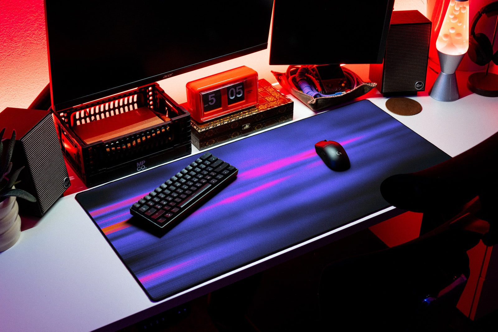 Glare desk mat in Violet Streak, shown on a styled desk setup