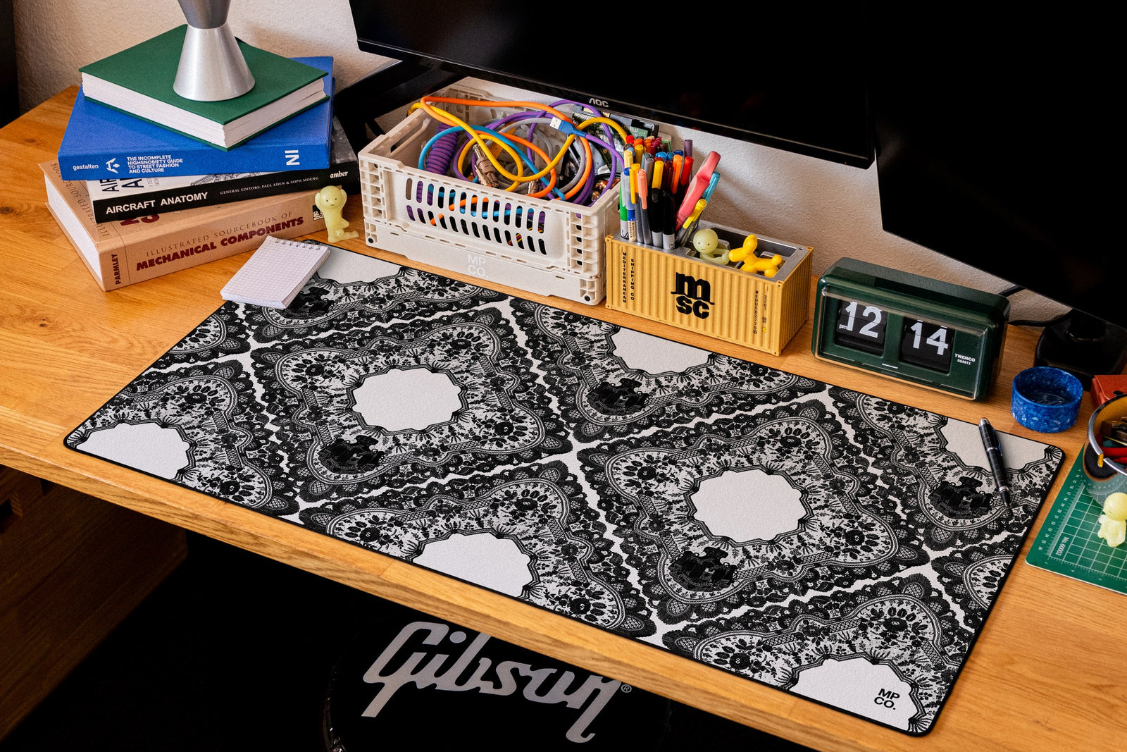 Gothic Diamonds desk mat in Original, shown on a styled desk setup