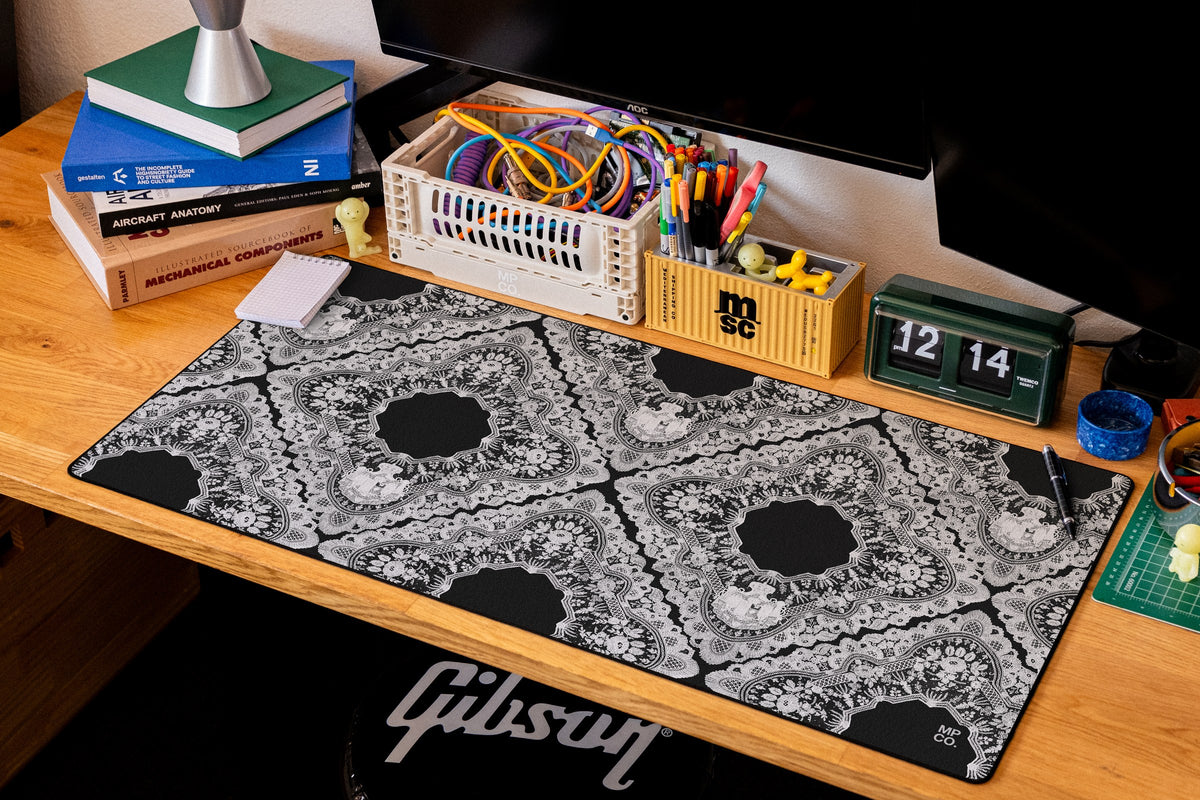 Gothic Diamonds desk mat in White, shown on a styled desk setup