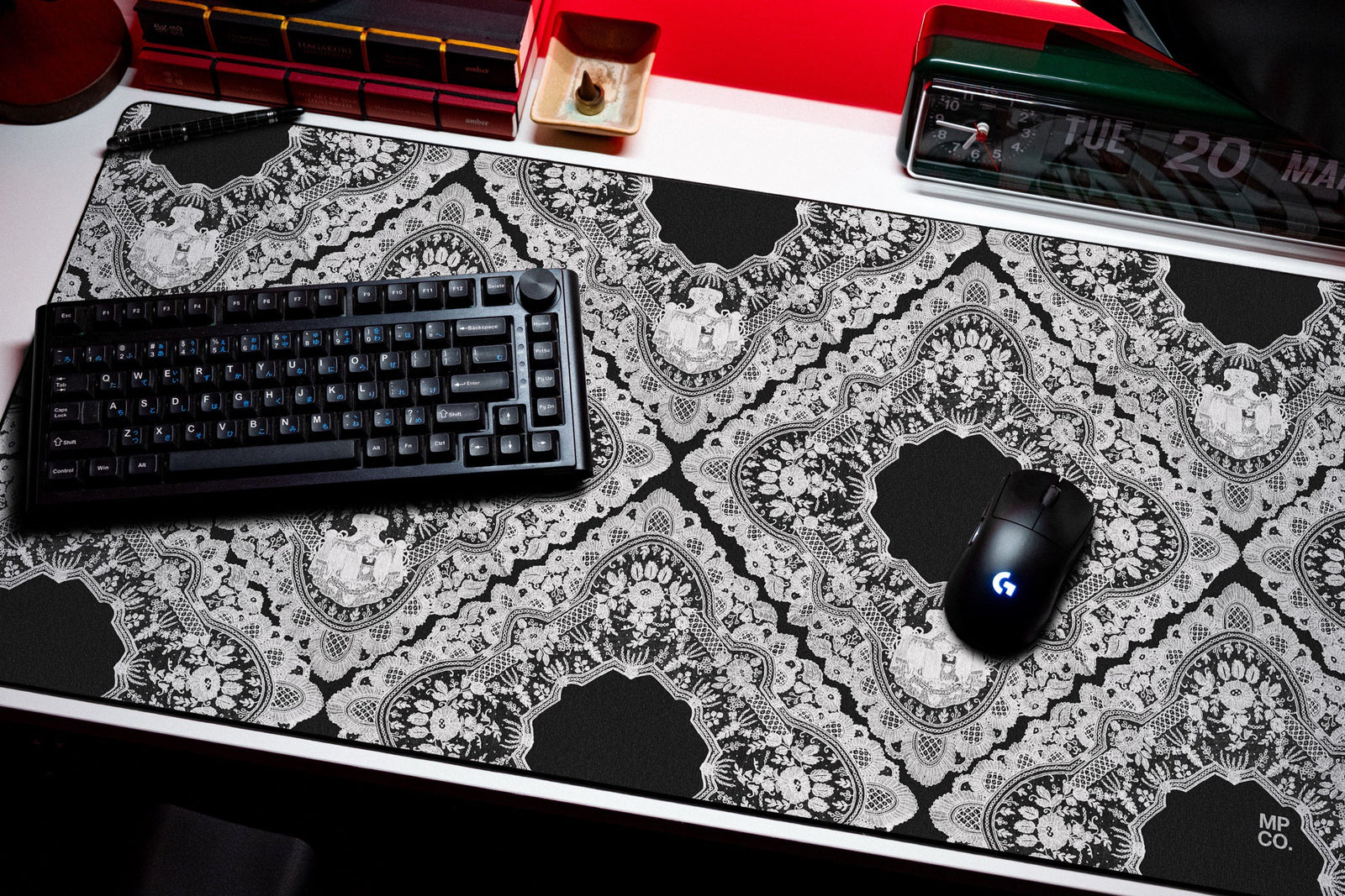 Gothic Diamonds desk mat in White, shown on a styled desk setup