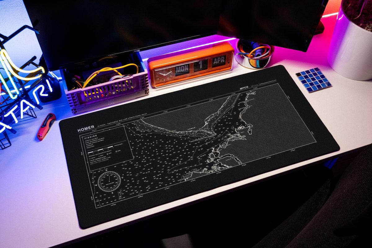 Homer Nautical Chart Pad desk mat in Black / White, shown on a styled desk setup