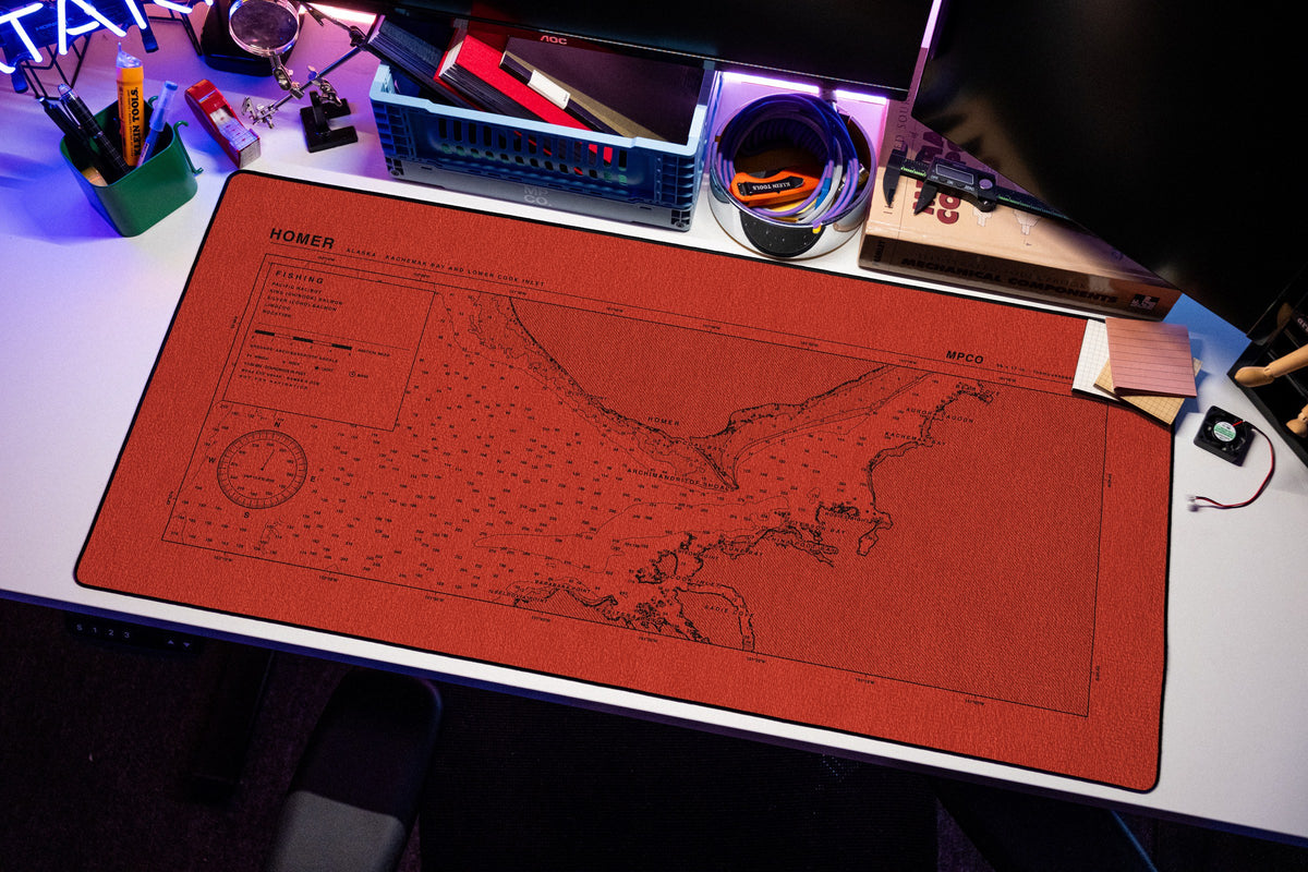 Homer Nautical Chart Pad desk mat in Red / Black, shown on a styled desk setup