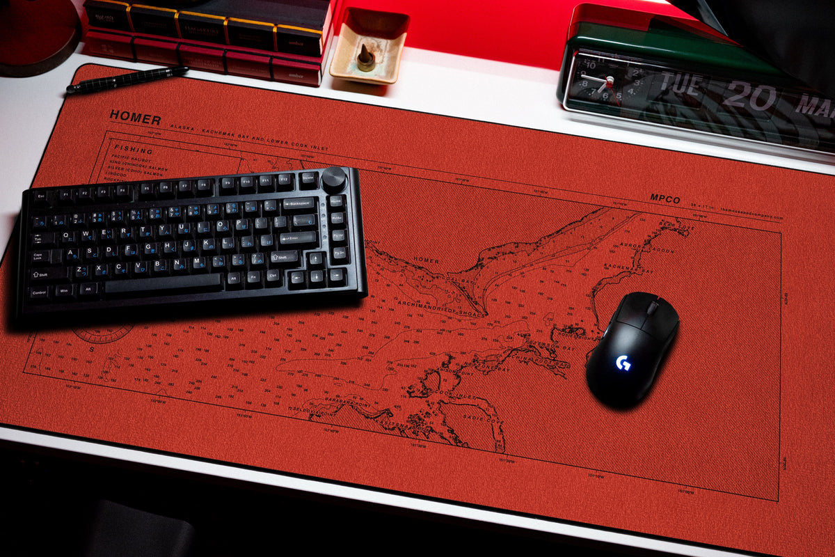 Homer Nautical Chart Pad desk mat in Red / Black, shown on a styled desk setup