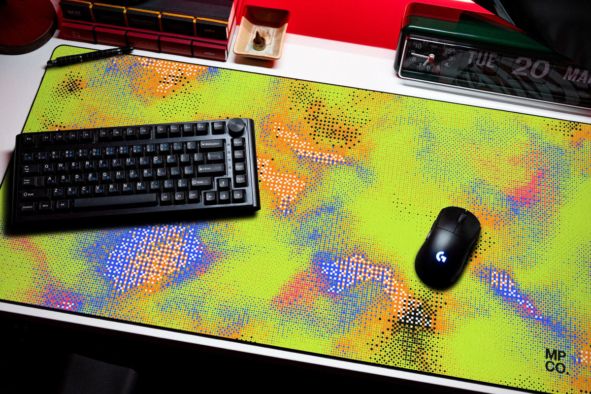 Hot Pixel desk mat in Acid, shown on a styled desk setup
