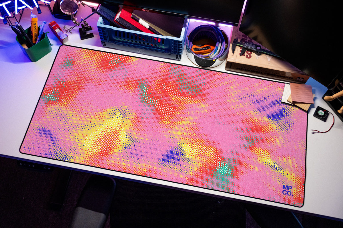 Hot Pixel desk mat in Bubblegum, shown on a styled desk setup