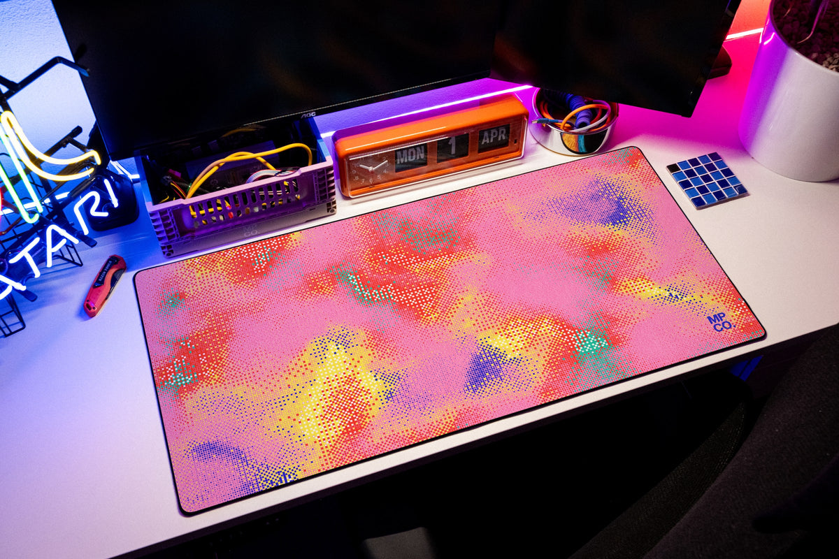 Hot Pixel desk mat in Bubblegum, shown on a styled desk setup