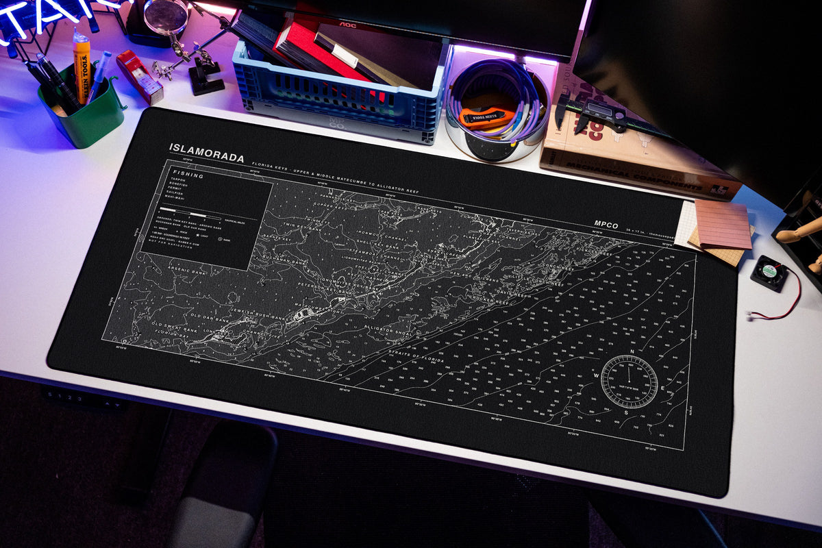 Islamorada Nautical Chart Pad desk mat in Black / White, shown on a styled desk setup